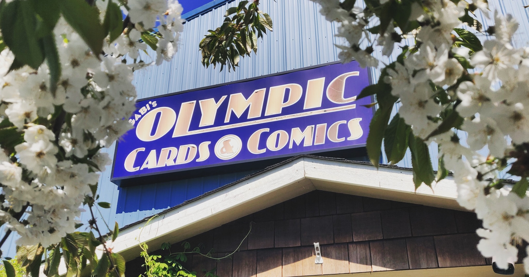 OLYMPIC CARDS & COMICS